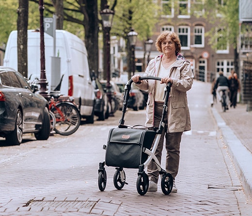 walking with a lightweight rollator walker